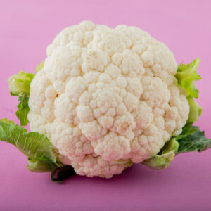 close-up view of cauliflower on purple background with copy space